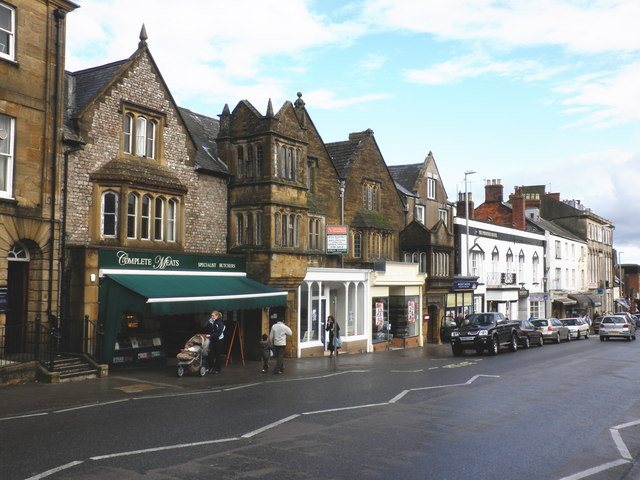 Fore Street in Chard with historic buildings and the Town Hall in the distance