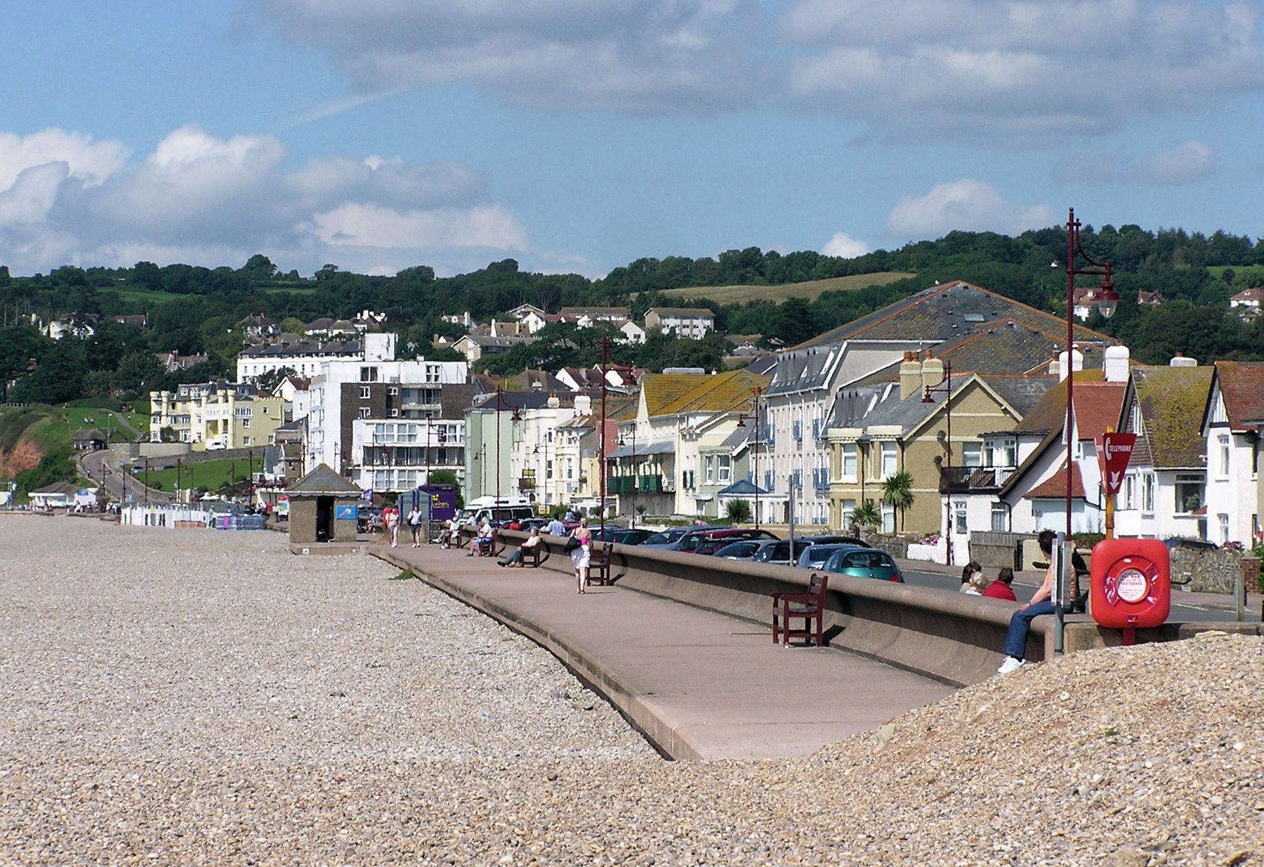 Seaton seafront, pebble beach and promenade looking towards the cliffs
